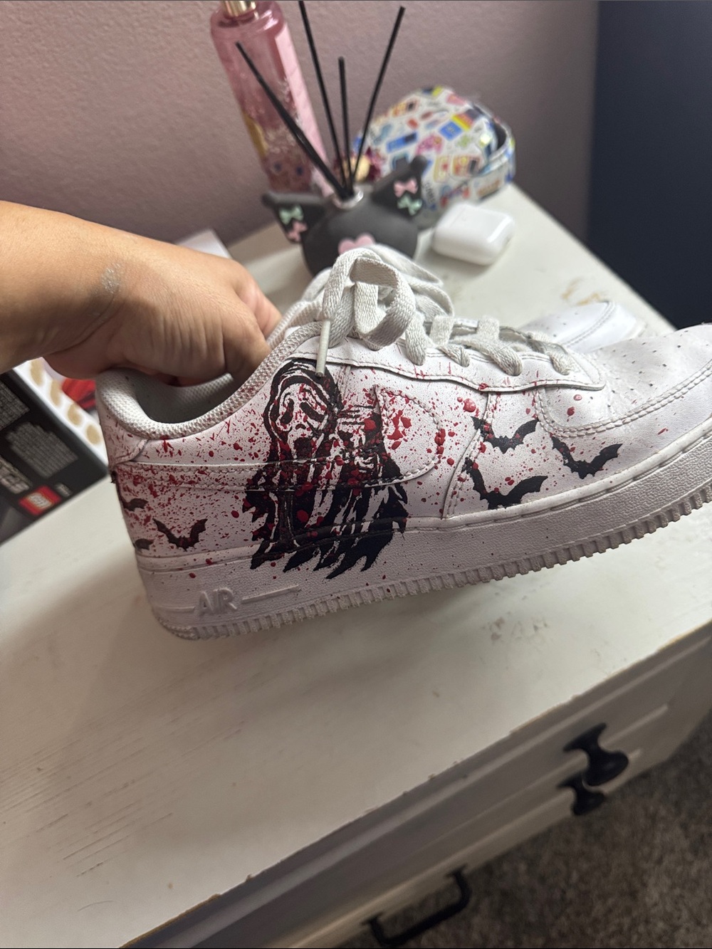 White Women's Graphic Low-Top Sneakers with Red Splatter and Black Bats